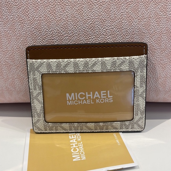 MICHAEL KORS
Leather Large Card Holder Case Wallet 
Vanilla MK Signature 
NWT - Picture 13 of 16